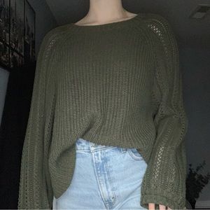 Knitted green sweater